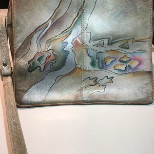 Shoulder bag -lots of organizers, painted design on front etc.